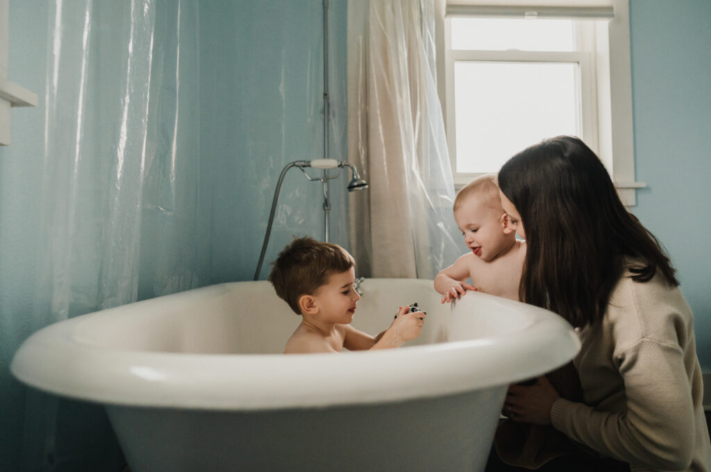 bath time with mom and two boys